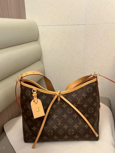 Click to view full screen Louis Vuitton M46203 CarryAll PM photo review